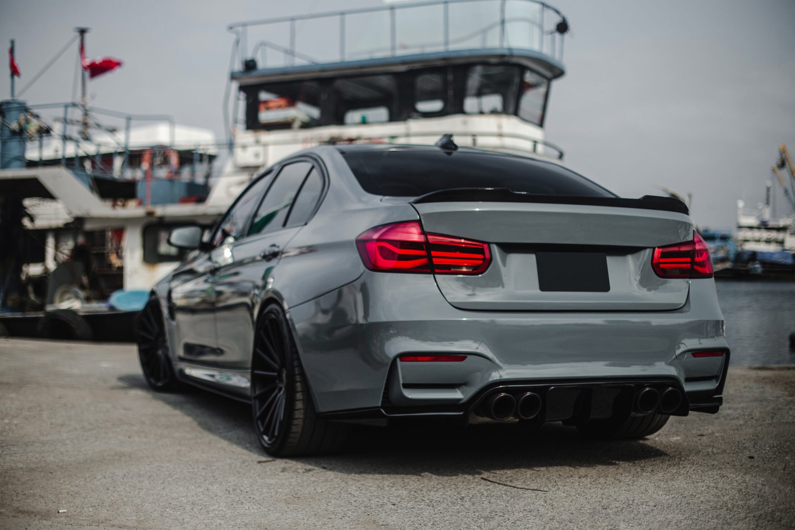 dark-silver-sedan-port