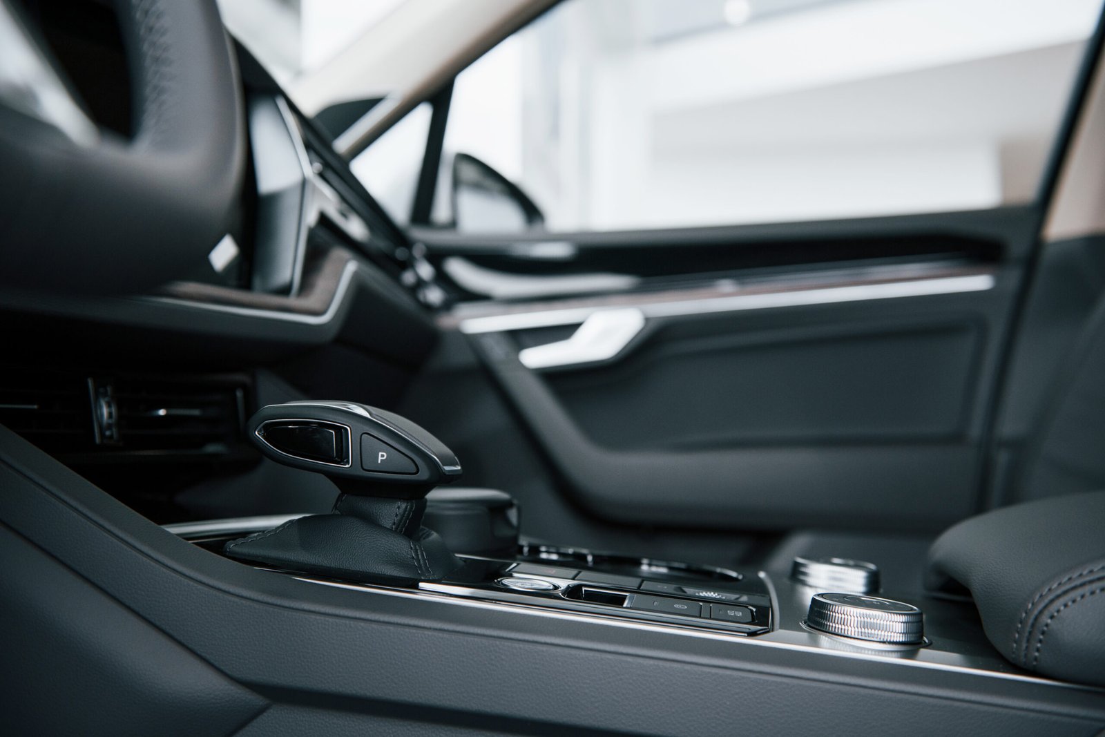 Gear stick. Close up view of interior of brand new modern luxury automobile.